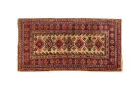 AN AFGHAN WOOL RUG