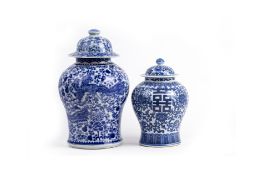 TWO BLUE AND WHITE BALUSTER JARS AND COVERS