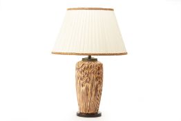 A CERAMIC TABLE LAMP