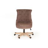 AN UPHOLSTERED OFFICE CHAIR