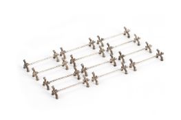 A SET OF TWELVE SLVER PLATED KNIFE RESTS