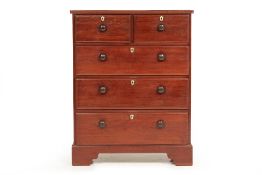 A MAHOGANY CHEST OF DRAWERS