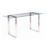 A CONTEMPORARY GLASS AND STAINLESS STEEL DESK