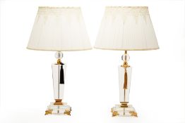 A PAIR OF GLASS AND GILT METAL TABLE LAMPS