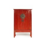 AN ANTIQUE CHINESE RED LACQUER CABINET