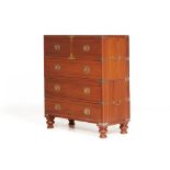 AN ANGLO INDIAN BRASS BOUND TEAK CAMPAIGN CHEST OF DRAWERS