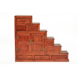 A ROSEWOOD TANSU STEP CABINET