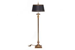 A BRASS STANDARD LAMP