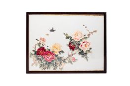 A FRAMED SILK EMBROIDERY