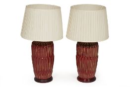 A PAIR OF RED TABLE LAMPS