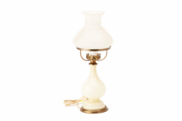 AN OIL LAMP STYLE TABLE LAMP