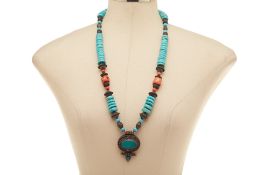A TURQUOISE AND CORAL PENDANT NECKLACE