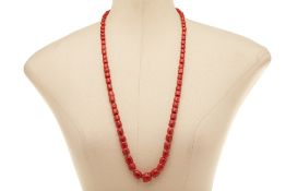 A SINGLE STRAND CORAL BEAD NECKLACE