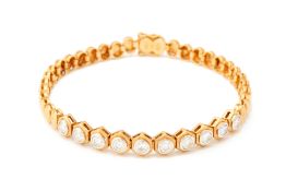 A GOLD AND DIAMOND BRACELET