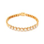 A GOLD AND DIAMOND BRACELET