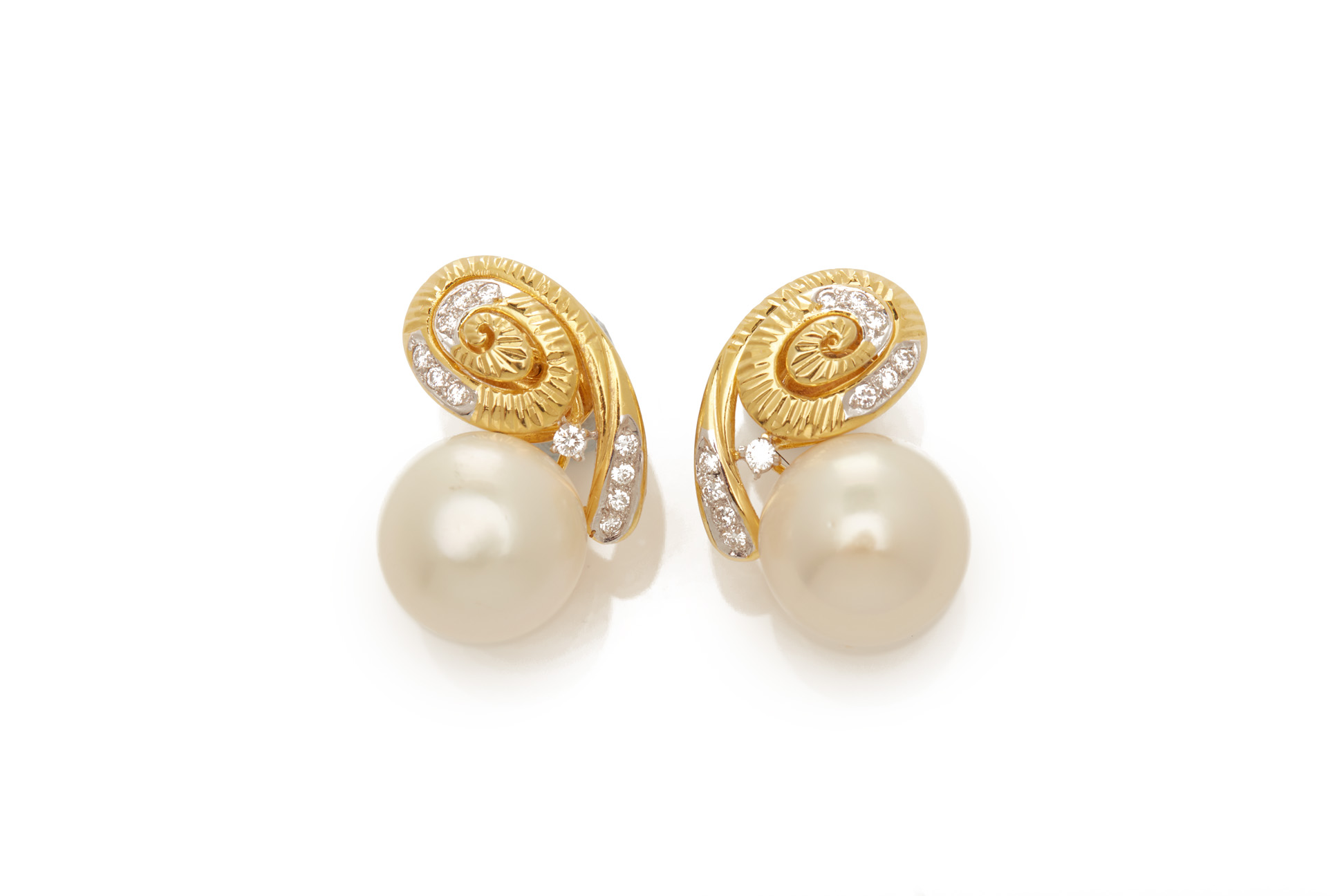 A PAIR OF CULTURED PEARL AND DIAMOND SHELL FORM EARRINGS