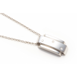 A PIAGET 18K WHITE GOLD DIAMOND PENDANT AND CHAIN