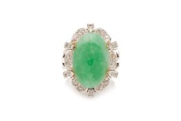 A JADE AND DIAMOND CLUSTER RING