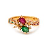 A DIAMOND, EMERALD & RUBY FLORAL RING