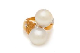 A BAROQUE CULTURED PEARL AND DIAMOND RING