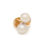 A BAROQUE CULTURED PEARL AND DIAMOND RING