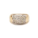 A GOLD PAVE SET DIAMOND BOMBE RING