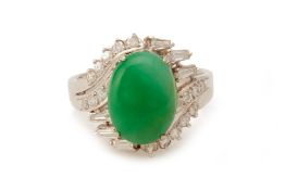 A WHITE GOLD DIAMOND AND CABOCHON JADE RING