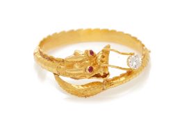 A GOLD HINGED DRAGON BANGLE