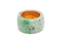 A JADE BAND RING WITH GOLD LINER