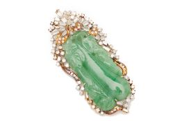 A CARVED JADE AND DIAMOND PENDANT