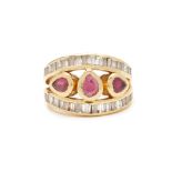 A GOLD DIAMOND AND RUBY RING