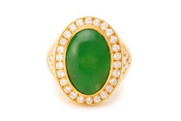 A DIAMOND AND CABOCHON JADE RING