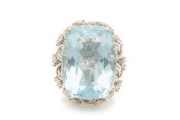 A LARGE AQUAMARINE AND DIAMOND COCKTAIL RING
