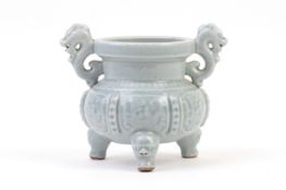 A QINGBAI GLAZED TWIN HANDLED TRIPOD CENSER