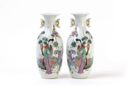 A PAIR OF FAMILLE ROSE TWIN HANDLED PORCELAIN VASES