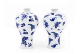 A PAIR OF SMALL BLUE AND WHITE BUTTERFLY MEIPING VASES