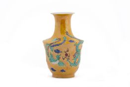 A SANCAI GLAZED DRAGON VASE