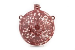 A COPPER RED PORCELAIN MOON FLASK