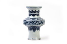 A CHINESE WAISTED BLUE AND WHITE PORCELAIN VASE