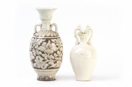 A CHIZOU TWIN HANDLED VASE AND A WHITE GLAZED VASE