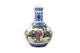 A FAMILLE ROSE BLUE AND WHITE BOTTLE SHAPE PORCELAIN VASE