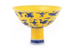 A YELLOW GROUND AND UNDERGLAZE BLUE STEM CUP