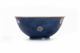 A BLUE GROUND SGRAFFITO FAMILLE ROSE PORCELAIN BOWL