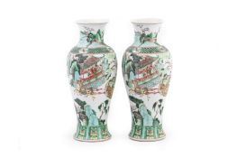 A PAIR OF FAMILLE VERTE BALUSTER PORCELAIN VASES