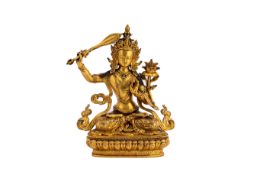 A GILT BRONZE FIGURE OF MANJUSHRI