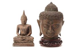 A BRONZE HEAD OF A BUDDHA AND A SEATED BUDDHA