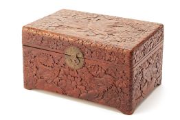 A CARVED WOODEN BOX