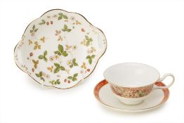 A WEDGWOOD CUP AND SAUCER AND A DISH