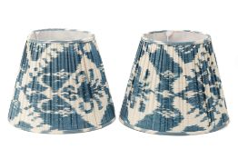 A PAIR OF BLUE SILK IKAT LAMP SHADES