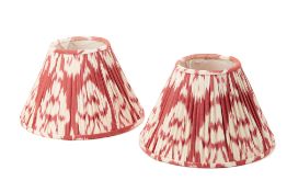 A PAIR OF SMALL RED SILK IKAT LAMP SHADES